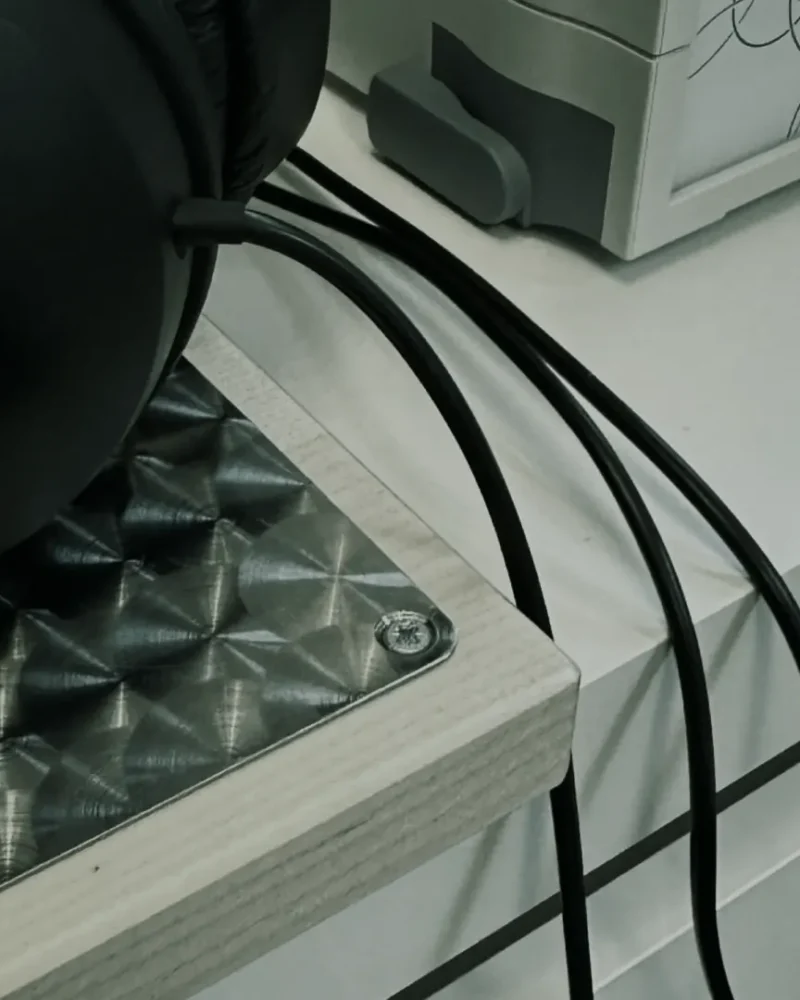 Bioresonance headset and sensor cables on a desk in the clinic consultation room